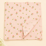 Soft baby muslin towel with tiny pink floral print.