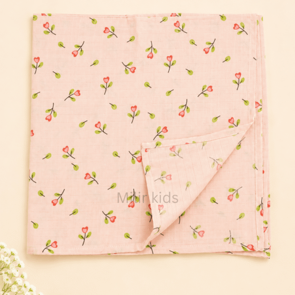 Soft baby muslin towel with tiny pink floral print.