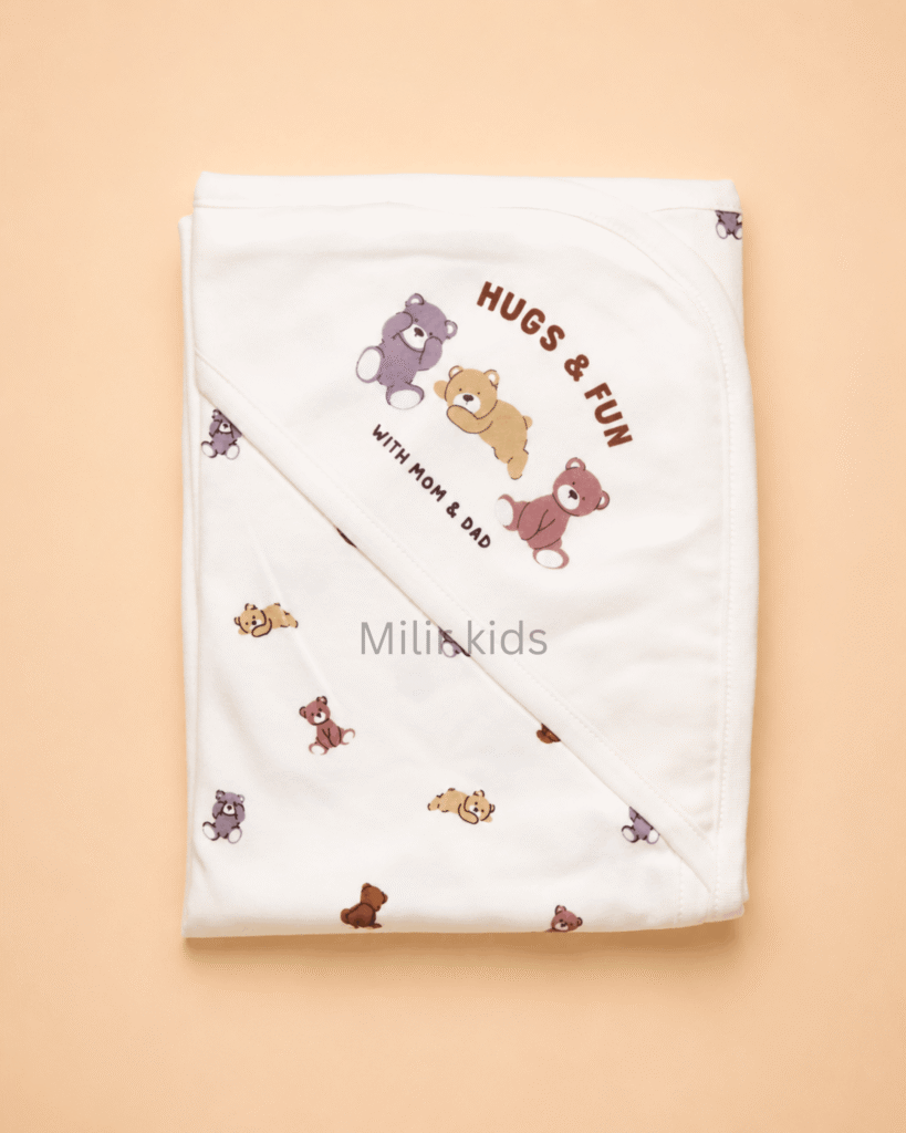 cream hooded baby towel with teddy bear print