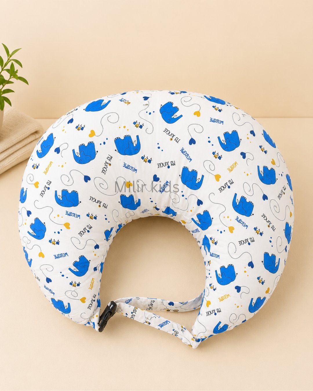 Blue elephant print baby feeding pillow with safety strap for breastfeeding and bottle feeding by Milir Kids