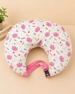 Pink baby feeding pillow with safety strap for breastfeeding and bottle feeding by Milir Kids