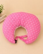 Pink baby feeding pillow with safety strap for breastfeeding and bottle feeding by Milir Kids