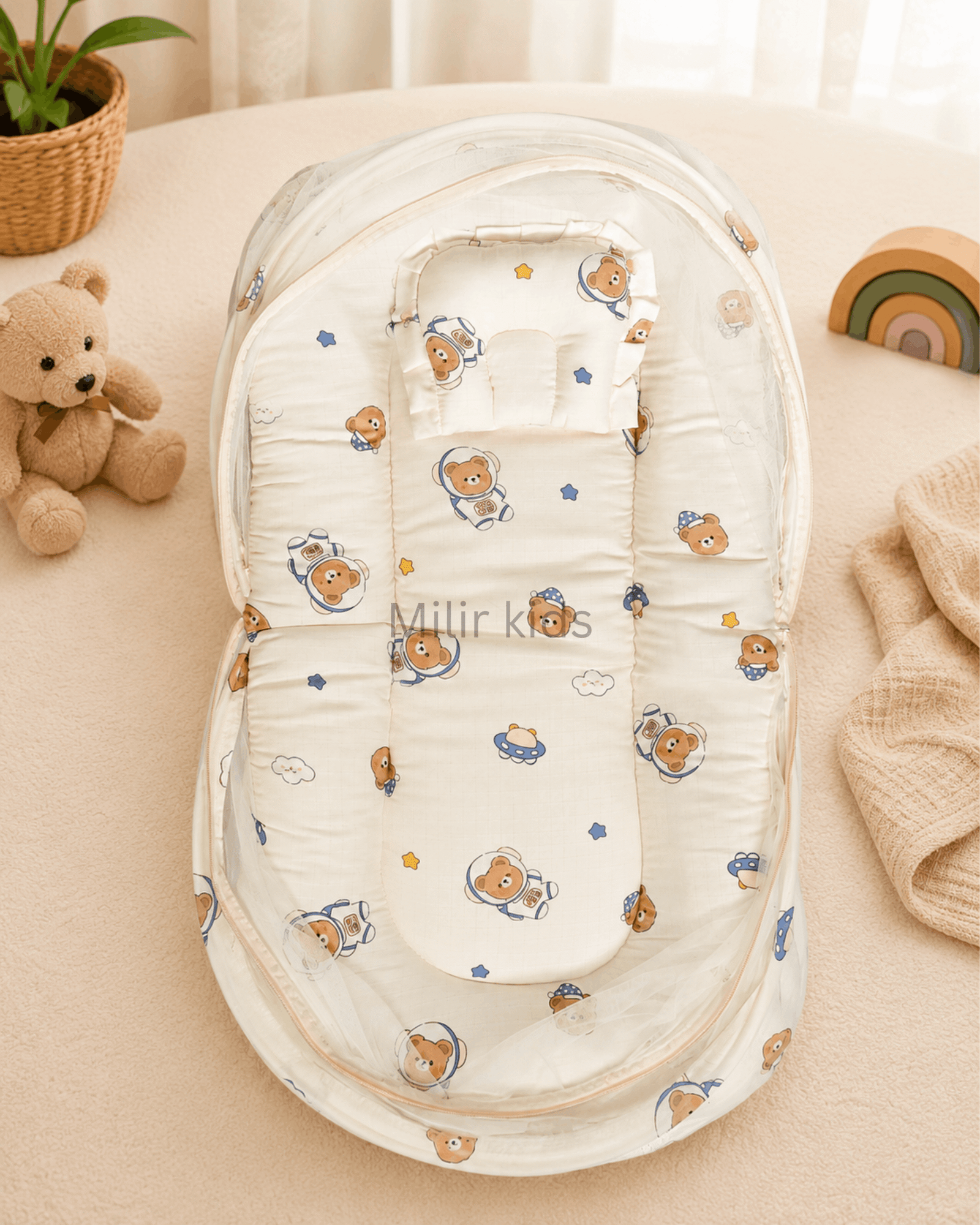 muslin-baby-bed-mosquito-net-cream-space-bear Premium muslin baby bed with mosquito net for newborn babies, soft breathable sleeping nest with head support cushion and portable design.