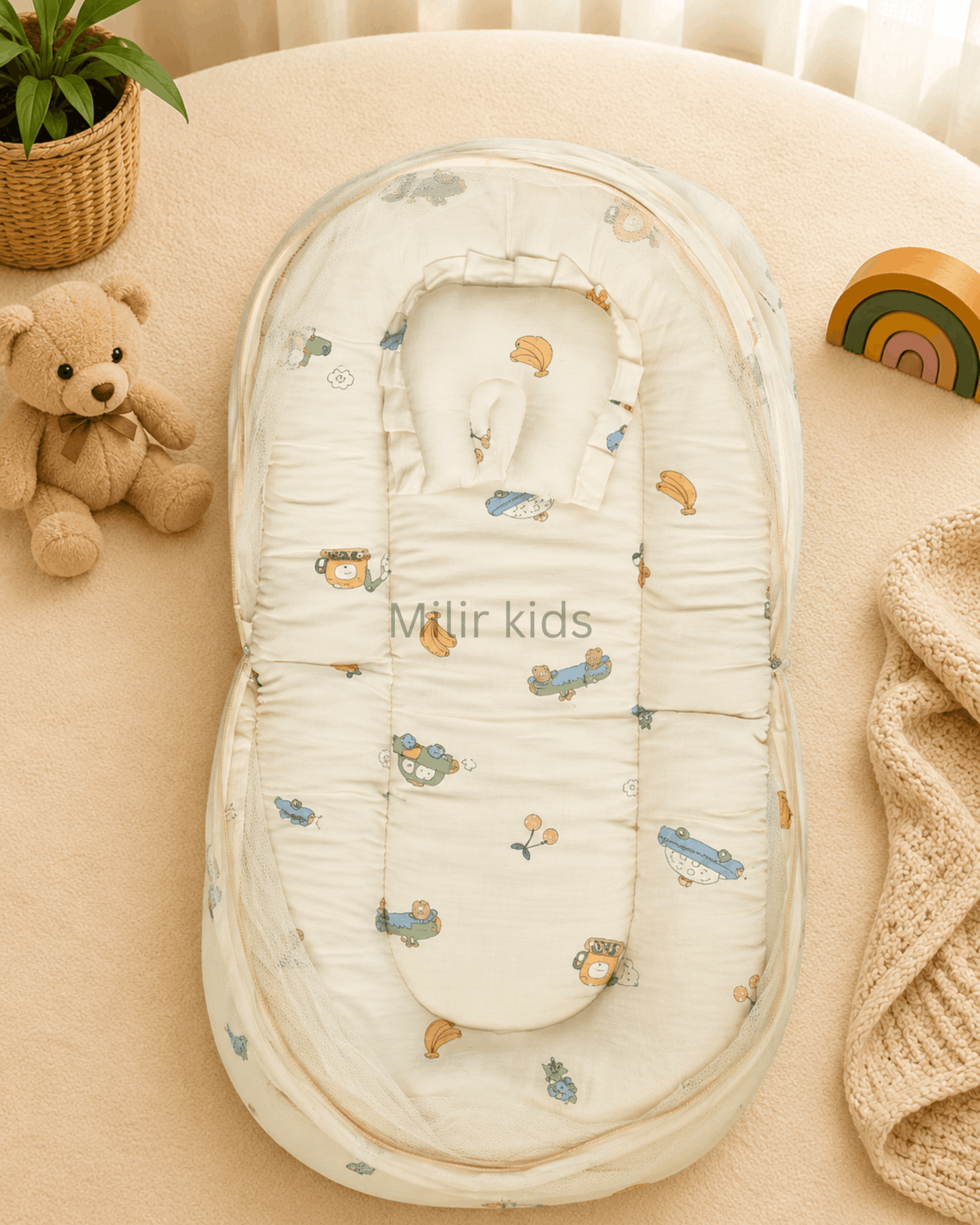 muslin-baby-bed-mosquito-net-cream-vehicles-print Premium muslin baby bed with mosquito net for newborn babies, soft breathable sleeping nest with head support cushion and portable design.