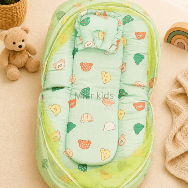 Premium muslin baby bed with mosquito net for newborn babies, soft breathable sleeping nest with head support cushion and portable design.