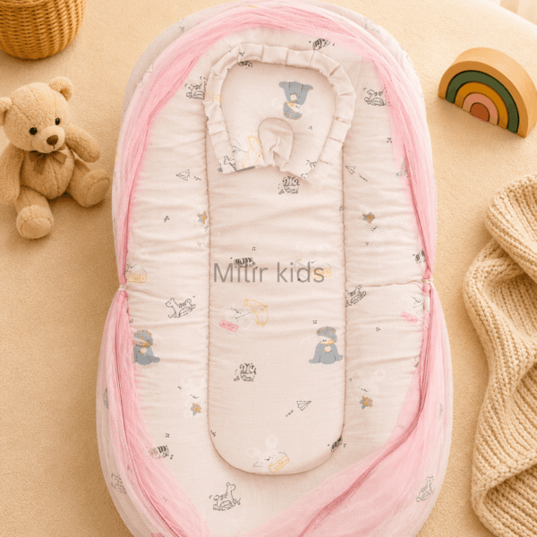 Premium muslin baby bed with mosquito net for newborn babies, soft breathable sleeping nest with head support cushion and portable design.