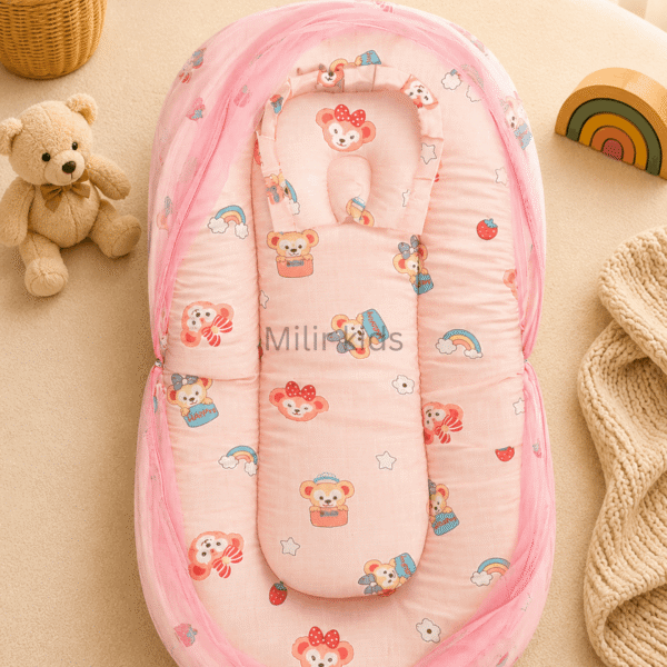 Premium muslin baby bed with mosquito net for newborn babies, soft breathable sleeping nest with head support cushion and portable design.