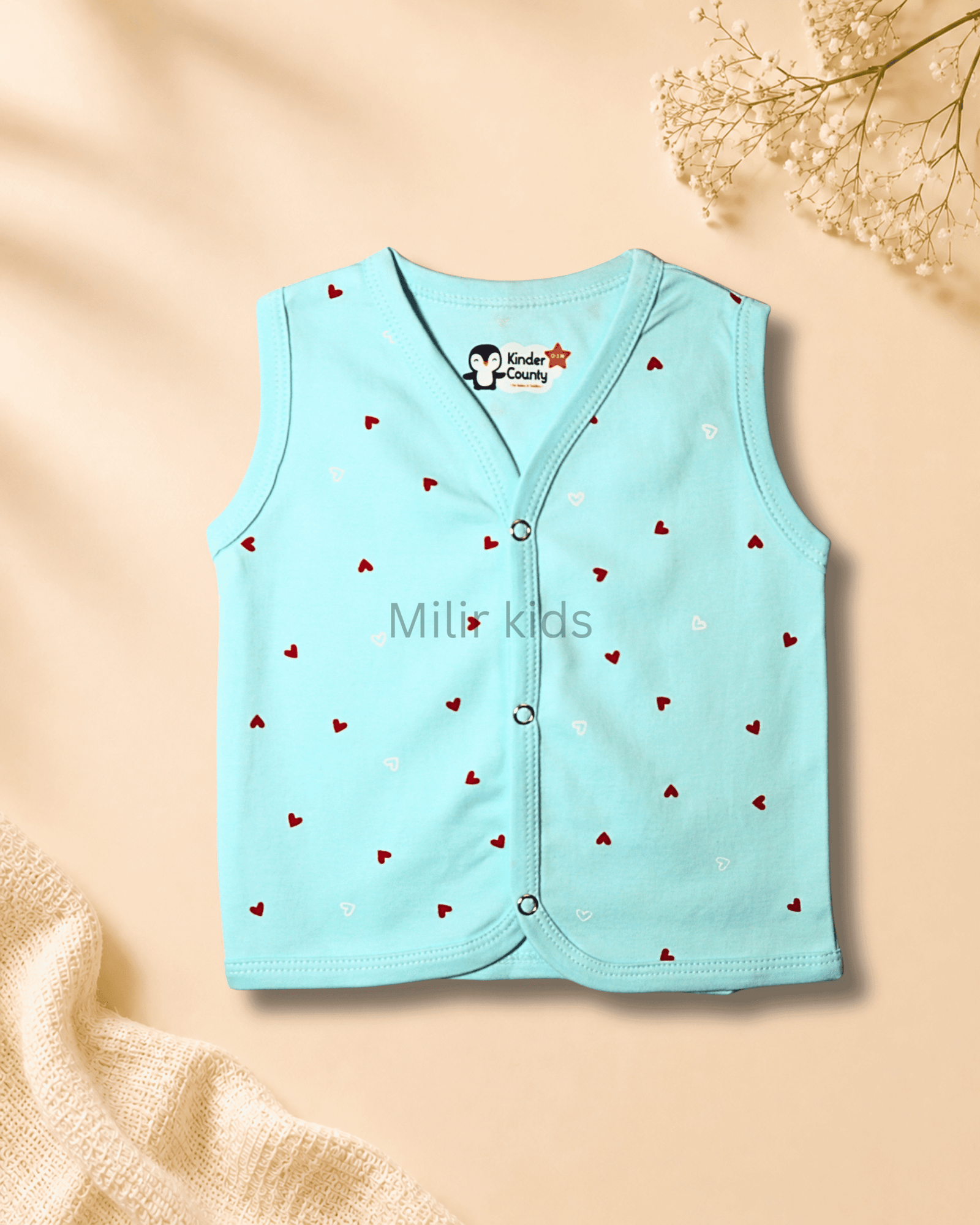 sky-blue-heart-sleeveless-baby-jabla Kinder County sleeveless cotton baby jabla for newborn babies featuring soft breathable fabric with front snap buttons.