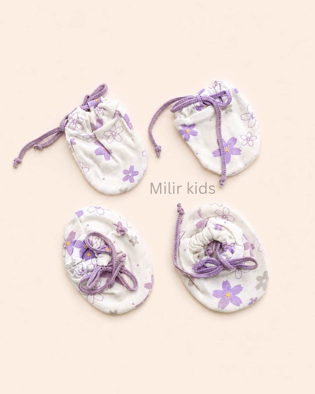 baby-cord-mittens-booties-floral-lavender Premium soft cotton newborn adjustable mittens and booties set for baby boys and girls.