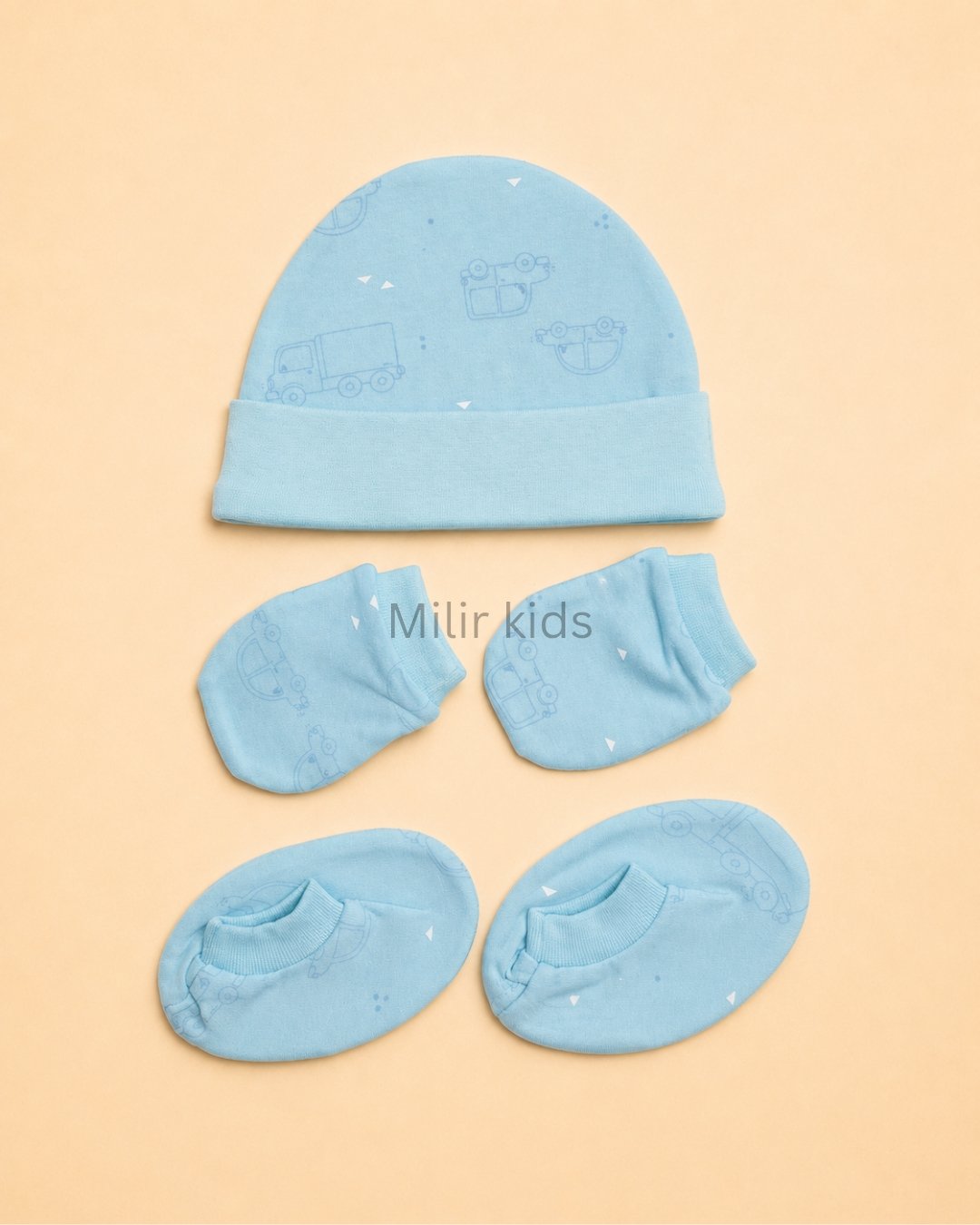 Premium Newborn Cap Mittens Booties Set Premium soft cotton newborn cap, mittens and booties set for baby boys and girls. Gentle on delicate newborn skin and ideal for everyday wear.
