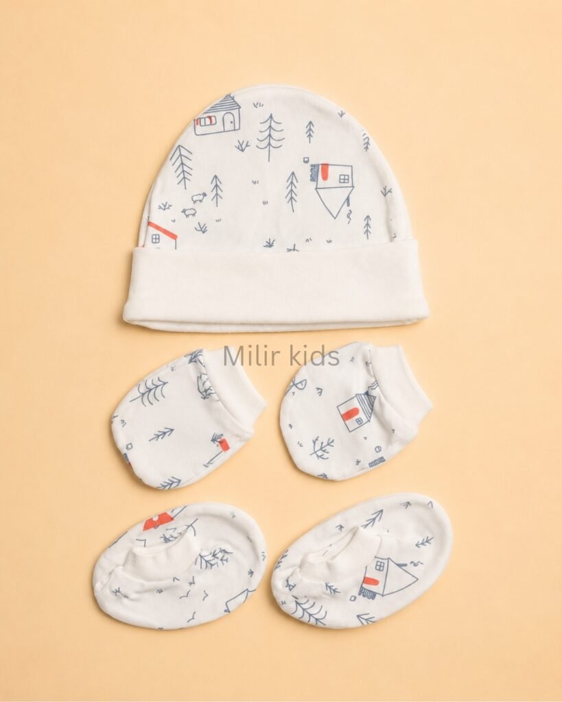 Premium soft cotton newborn cap, mittens and booties set for baby boys and girls. Gentle on delicate newborn skin and ideal for everyday wear.